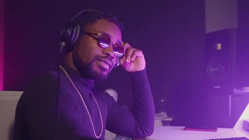 Sound Engineer Creating Music Track in Audio Studio