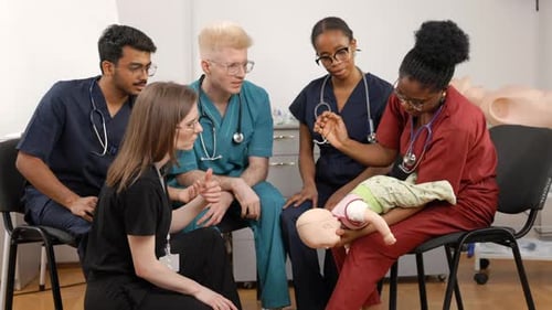 Medical Training Session with Baby CPR Dummy