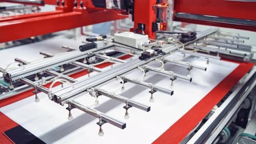 Modern manufacturing equipment inside the plant. Automated technologies in the factory indoors.