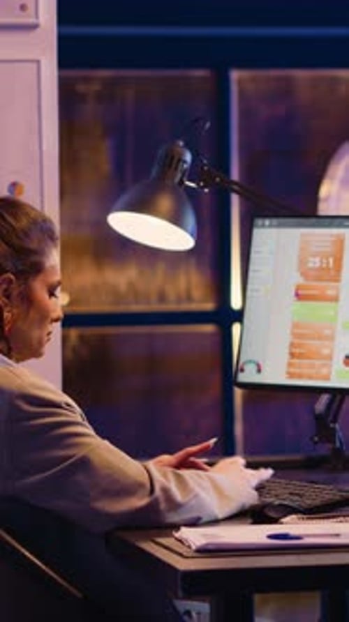 Vertical Video Businesswoman Analyzing Online Report with Graphs