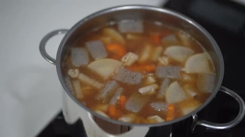 Pot of Stew Simmering on the Stove