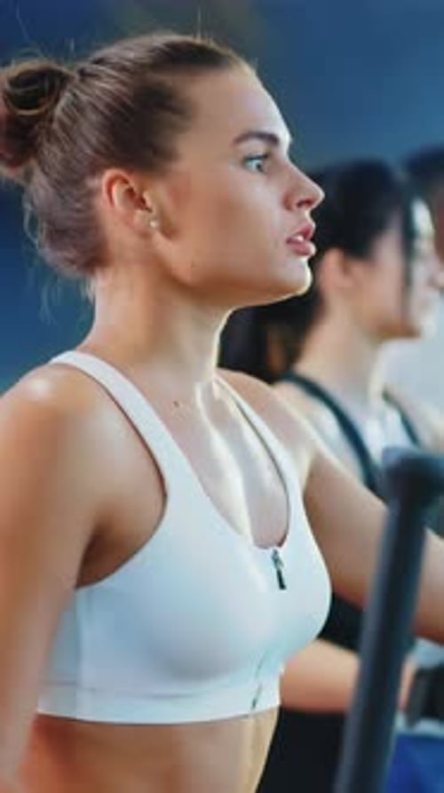 An Engaging and Focused Workout Session in a Modern and Innovative Gym Environment