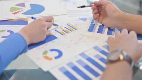 Close up of Creative People Working on Documents