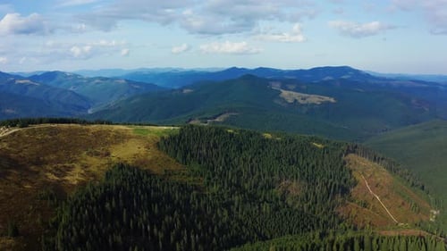 Stunning Mountain Forest Panorama Against Charming Cloudy Sky National Park. Drone View