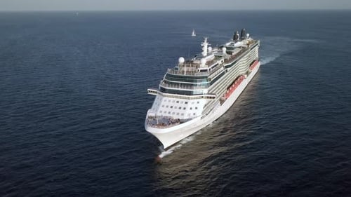 Mega Cruise ship sailing across The Mediterranean sea - Aerial footage