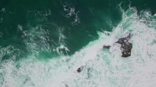 Powerful Ocean Crashing Rocks Top View Turquoise Waves Hitting Dangerous Cliffs