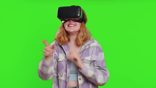 Woman Using VR Headset and Interacting on Green Screen
