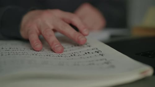 Sheet Music Composition With Laptop Close Up