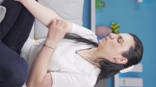 Vertical video of Woman with itchy arms.