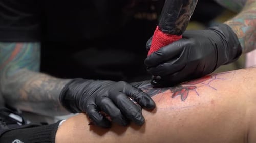Close up of a tattoo artist working 4K