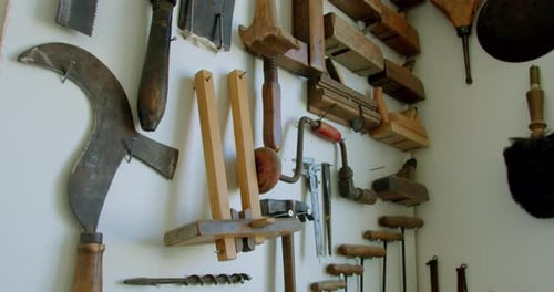 Close-up of work tools in a joinery and DIY workshop, such as hammers and screwdrivers.