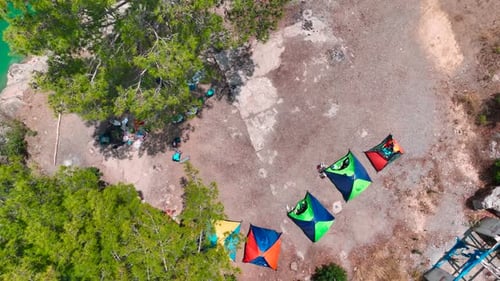 Aerial View Paddleboarding Through Scenic Green Canyon People Relax and Enjoy Summer Fun