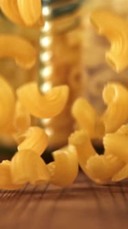 Super Slow Motion Dry Macaroni Pasta Filmed on a Highspeed Camera at 1000 Fps