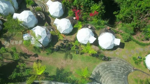 Glamping on the Green Hill at Batur Volcano Background with Black Lava in Kintamani Bali Indonesia