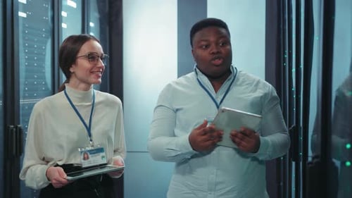 A Diverse Team Engaging in a Lively Discussion of Creative Ideas in a Modern Office Environment