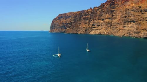Seascape with Huge Rocks in Deep Blue Atlantic Ocean at Sunny Vivid Day