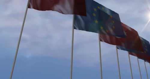 Waving Flags of European Union and Turkey in Blue Sky