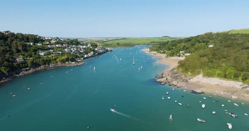 Salcombe Harbour On Summer Afternoon Boaters And Beachgoers Aerial Drone Shot