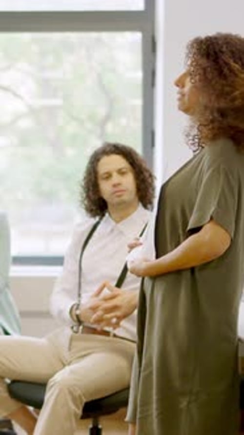 Manager Showing Data Using Graphics During a Meeting