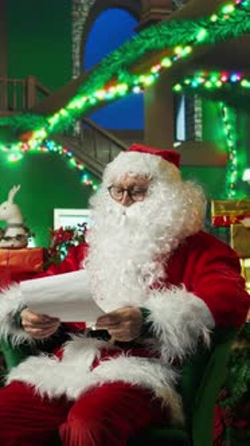 Santa Claus Reads Letter Indoors