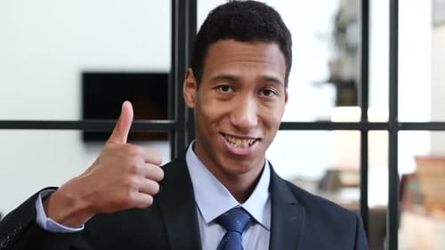 Thumbs Up By Black Businessman