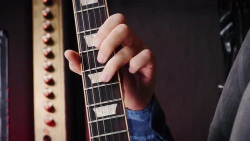 Electric guitar strings, close up. Vertical video