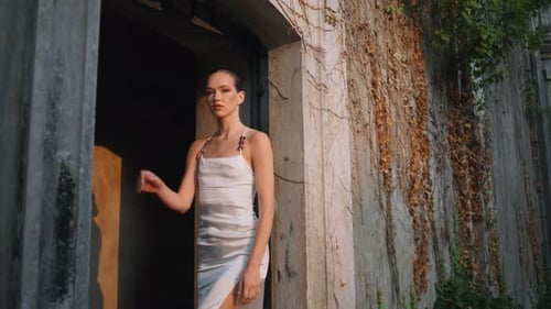 Girl Standing Castle Arch at Evening Sunlight Sensual Woman Touching Old Wall