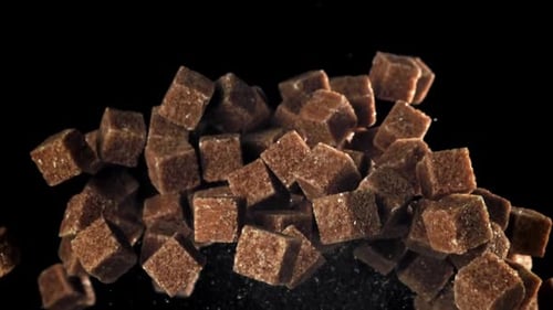 Cane Sugar Cubes Fly Up and Fall Down Filmed on a Highspeed Camera at 1000 Fps