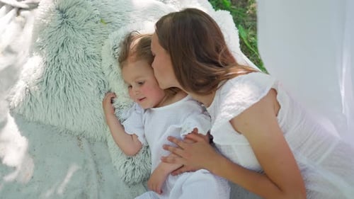 Woman and Child Loving Moment Outdoors