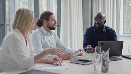 Multi-Ethnic Business Workers Having Meeting at Office