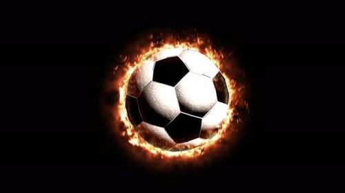 Spinning Football Ball on Fire Isolated on Black Soccer