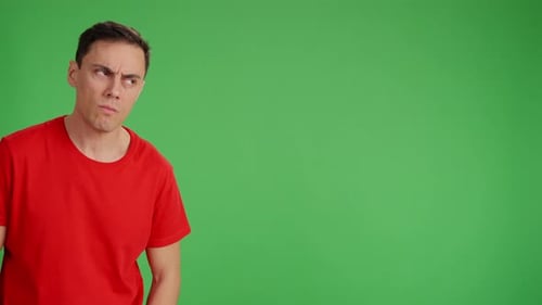 Man Expressing Disgust and Displeasure on Green Screen