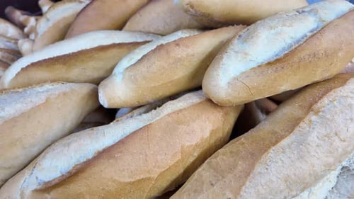 Fresh Bread Rolls at Local Market in Morning Light