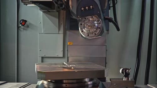 Rotating Automated Machine with Metal Plate and Drill Media Automated Machine with Drill and Metal