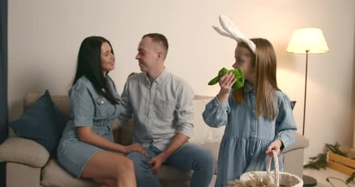 Family Preparing for Easter Together in Their Home