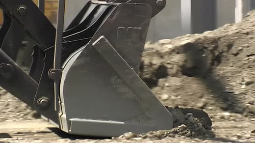 Excavator Loading Dirt