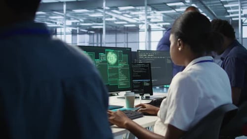 Team Responds to Cyberattack in Bright Modern Office