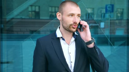 Portrait of Handsome Businessman Talking on Phone Near Office Young Business Man Speaking on