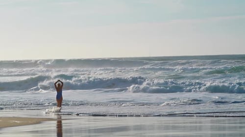 Silhouette Going Ocean Waves on Stormy Day. Dangerous Sea Water Rolling Beach