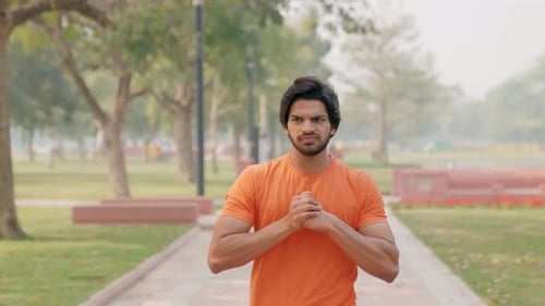 Angry Indian Man Cracking Bones While Walking