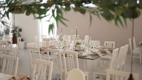 Wedding Reception Tables with Flowers and Candles