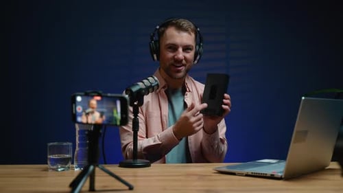 Man Reviews Tech During Home Broadcast