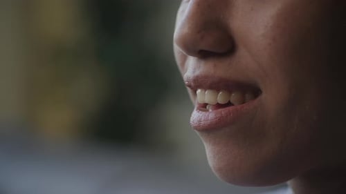 Female Mouth Speaking and Smiling Close Up