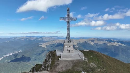 View of the Cross of Heroes on Mount Caraiman in the Bucegi Mountains, Romania