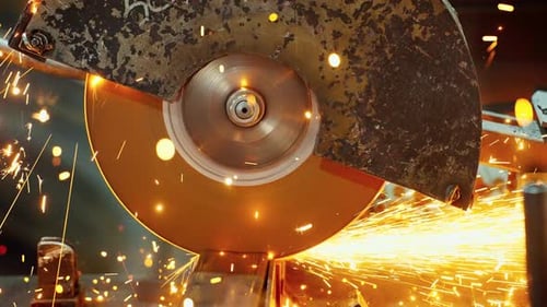 Industrial Saw Cuts Metal With Sparks