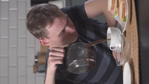 Exhausted Man Drinking Coffee