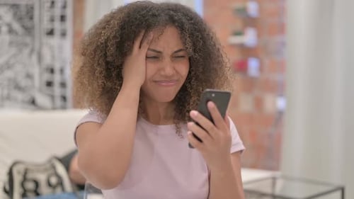 Distressed Young Adult Reacts to Phone News