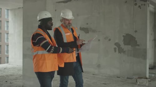Engineers Inspect Building Construction Site