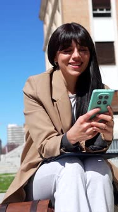 Young university student taking a selfie outside on campus