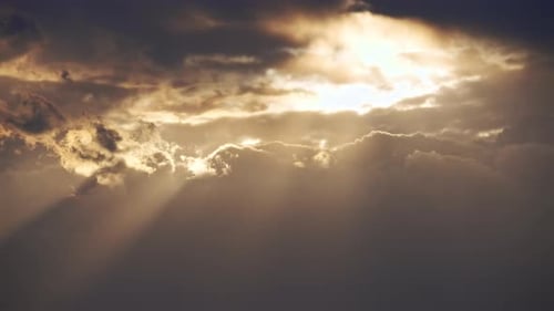 Sun Rays Breaking Through Thick Clouds